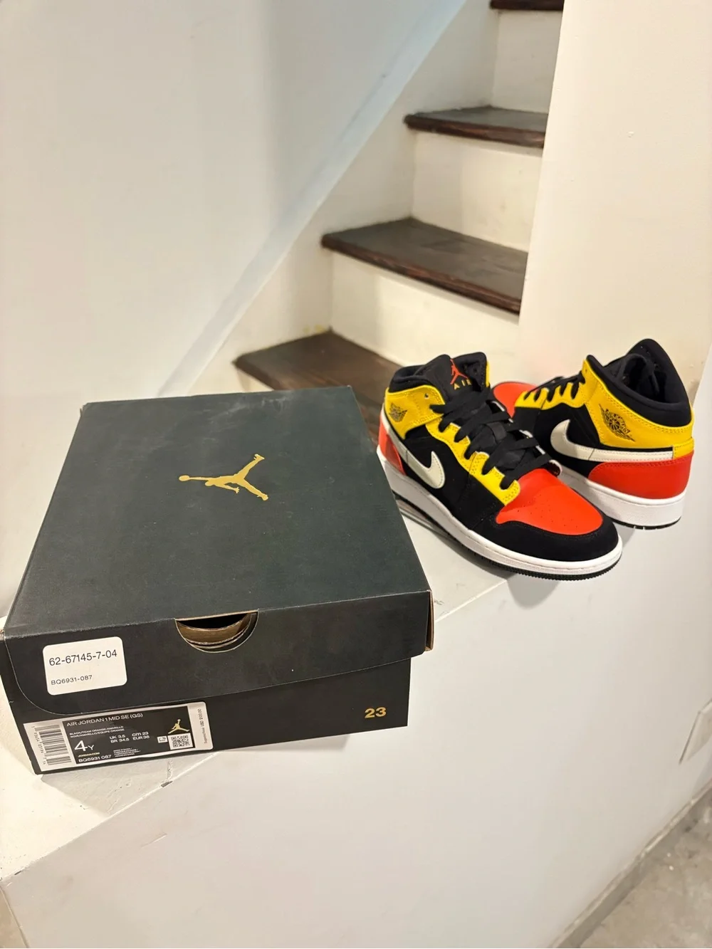 Jordan Air Jordan 1 Mid SE Black/Orange/White Youth Sneaker